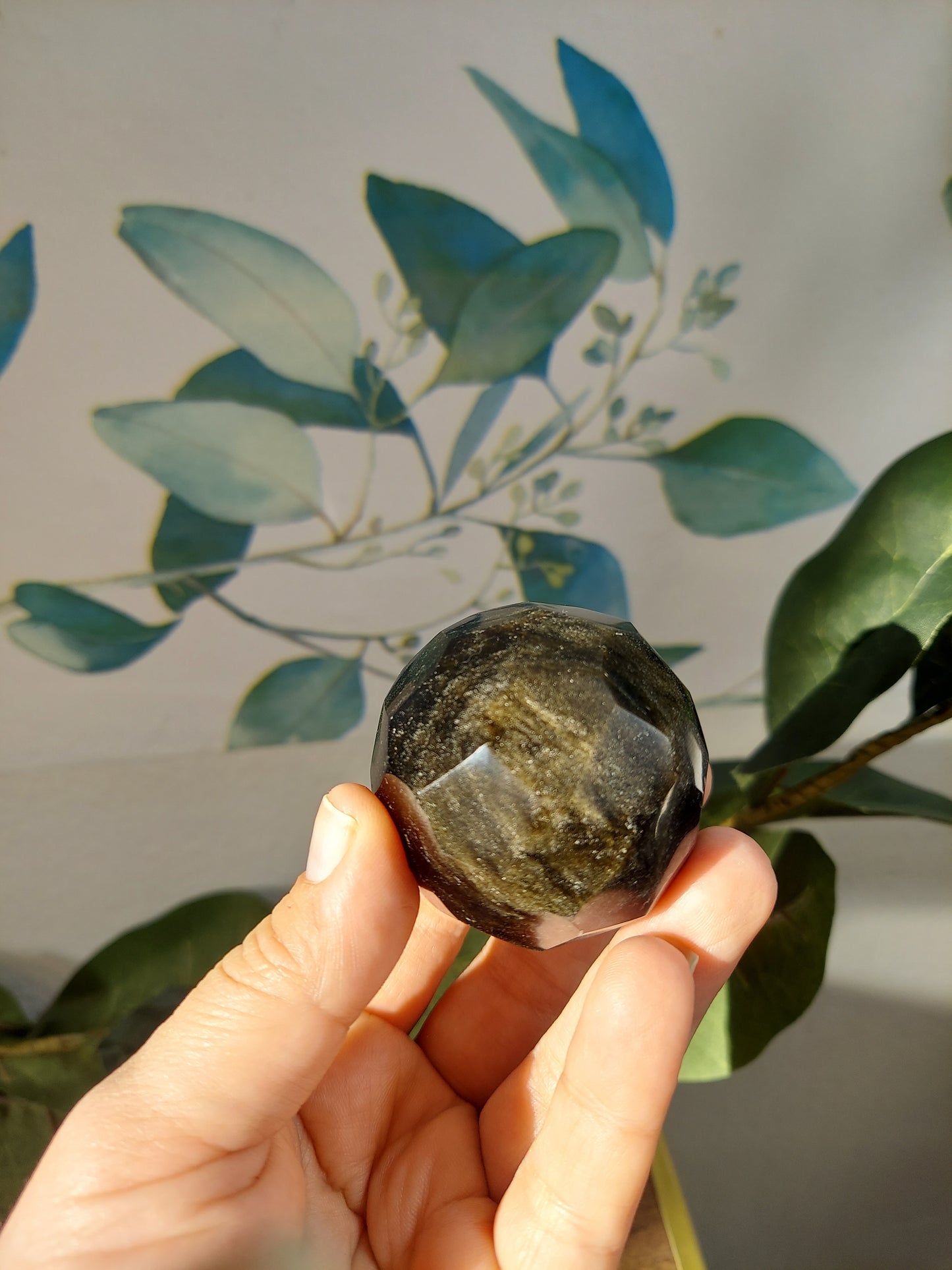 Goldsheen obsidian faceted sphere