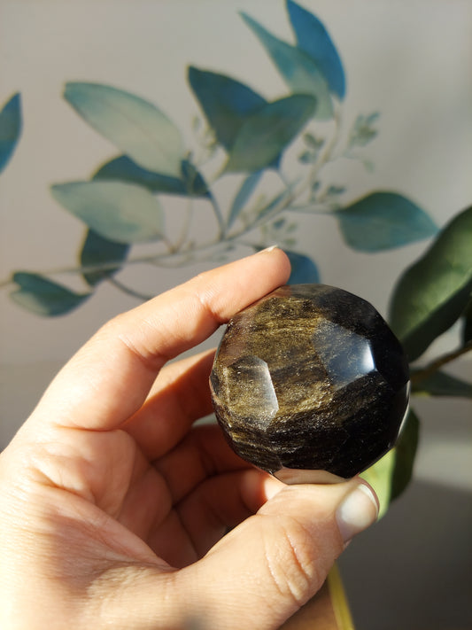 Goldsheen obsidian faceted sphere