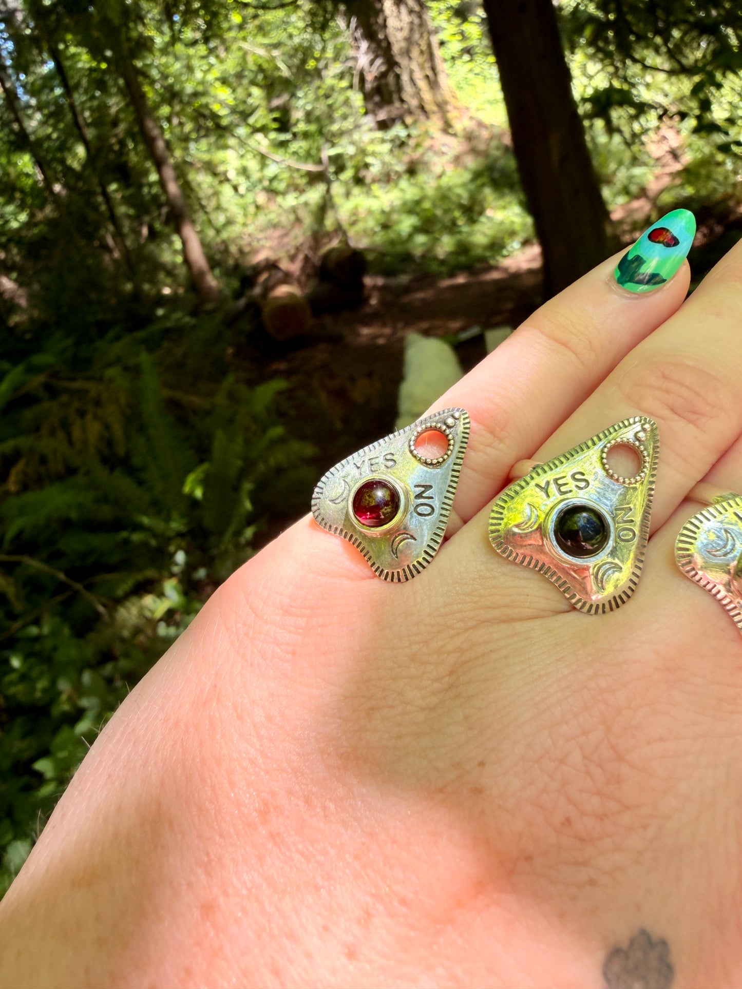 Planchet Shaped Sterling Silver Garnet Ring