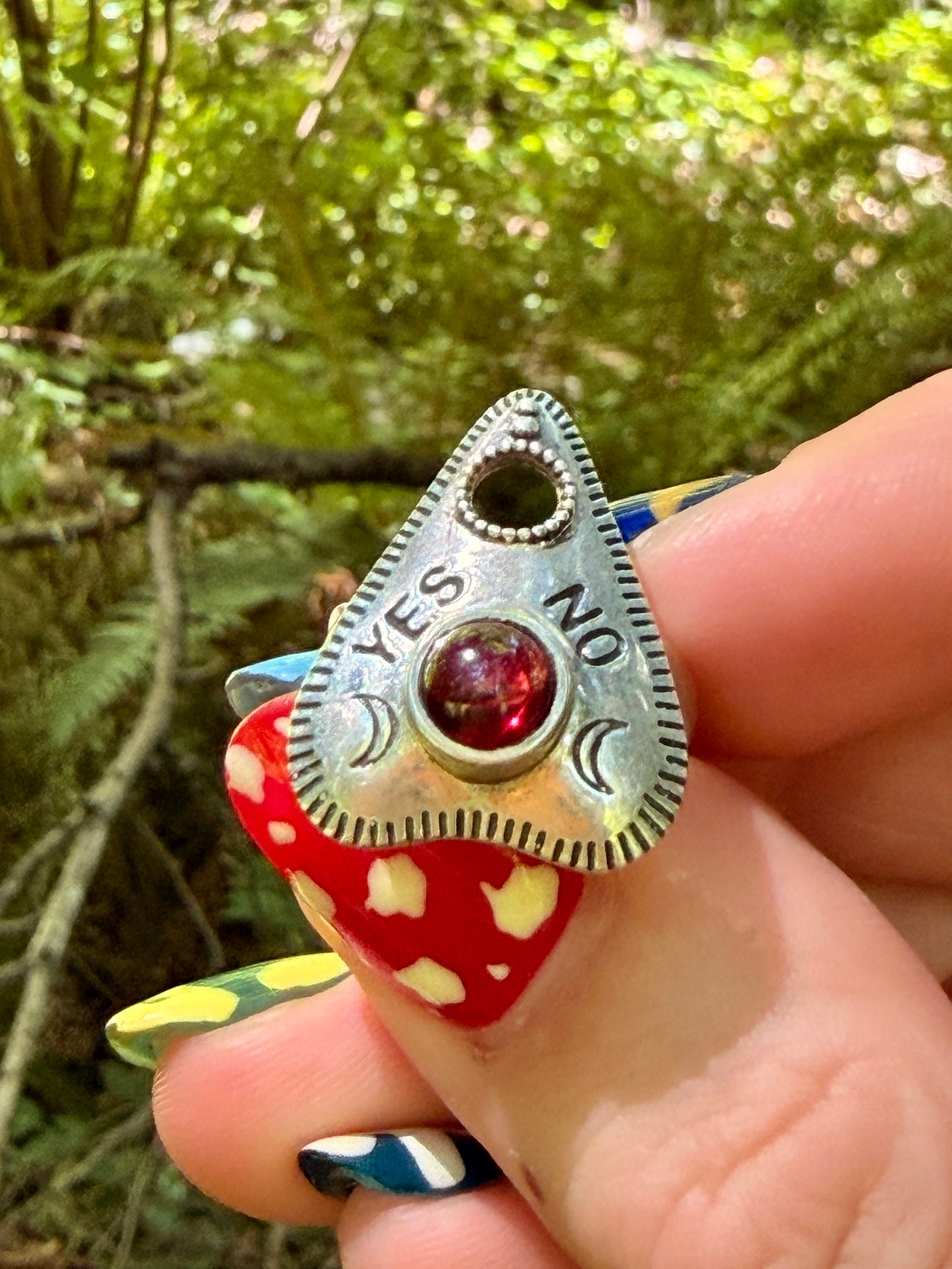 Planchet Shaped Sterling Silver Garnet Ring