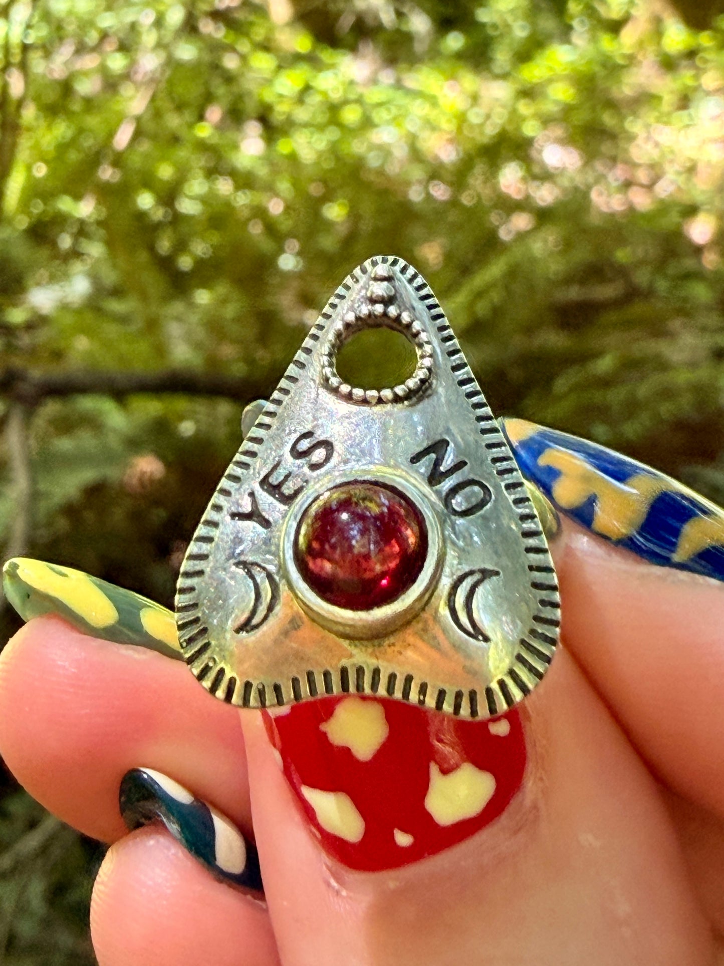 Planchet Shaped Sterling Silver Garnet Ring